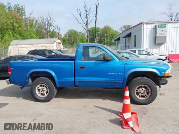 1999 Dodge Dakota with VIN 1B7GG26X3XS142920, listed as a IAAI auction lot 42116843 with 300,139 mi miles and . Bid and sale history available at DreamBid. Image 13.
