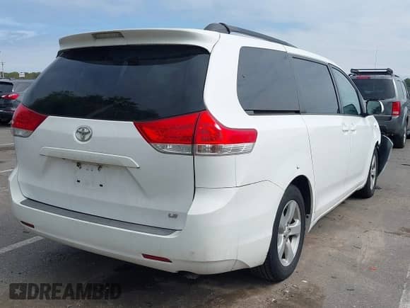2013 Toyota Sienna LE AAS with VIN 5TDKK3DC3DS308565, listed as a IAAI auction lot 43281154 with 221,342 mi miles and . Bid and sale history available at DreamBid. Image 4.