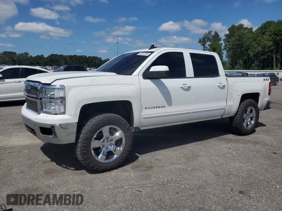 2015 Chevrolet Silverado 1500 LT с VIN 3GCUKRECXFG465019, выставлен на аукционе Copart как лот 80157265 с пробегом 129 761 миль миль и Списание • Salvage title. История ставок и продаж доступна на DreamBid. Изображение 1.