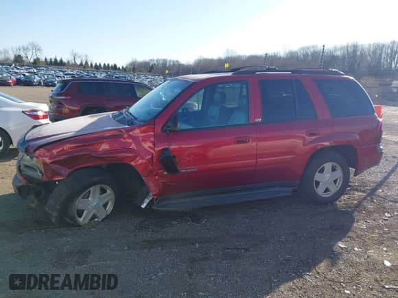 2002 Chevrolet TrailBlazer LTZ z VIN 1GNDT13S322141266, wystawiony jako IAAI lot #41977500 z przebiegiem 232 011 mil mil oraz . Historia ofert i sprzedaży dostępna na DreamBid. Obrazek 15.