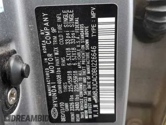 2011 Hyundai Tucson Limited with VIN KM8JUCAC0BU226646, listed as a Copart auction lot 80653715 with 105,174 mi miles and Salvage title. Bid and sale history available at DreamBid. Image 12.