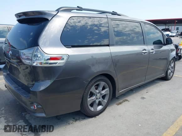 2014 Toyota Sienna SE with VIN 5TDXK3DC7ES487541, listed as a IAAI auction lot 42998929 with 214,475 mi miles and . Bid and sale history available at DreamBid. Image 4.