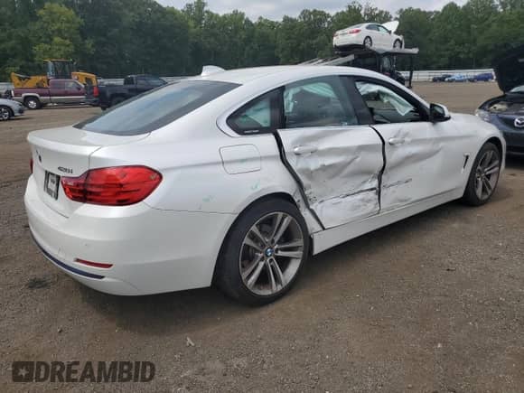 2016 BMW 4 Series 428i xDrive z VIN WBA4C9C51GG136270, wystawiony jako Copart lot #67798155 z przebiegiem 65 597 mil mil oraz Szkoda całkowita • Salvage title. Historia ofert i sprzedaży dostępna na DreamBid. Obrazek 3.