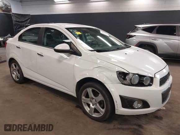 2015 Chevrolet Sonic LTZ with VIN 1G1JE5SBXF4204879, listed as a IAAI auction lot 41835717 with 145,174 mi miles and . Bid and sale history available at DreamBid. Image 1.
