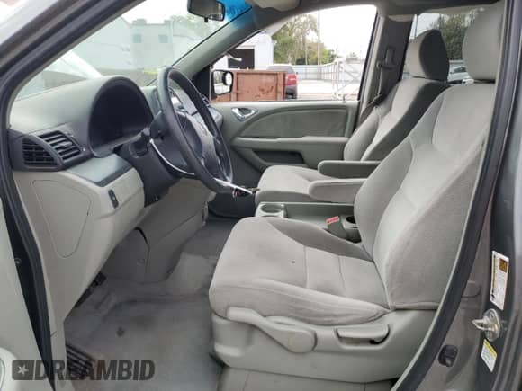2007 Honda Odyssey LX with VIN 5FNRL38217B025524, listed as a Copart auction lot 85320355 with 179,968 mi miles and Salvage title. Bid and sale history available at DreamBid. Image 7.