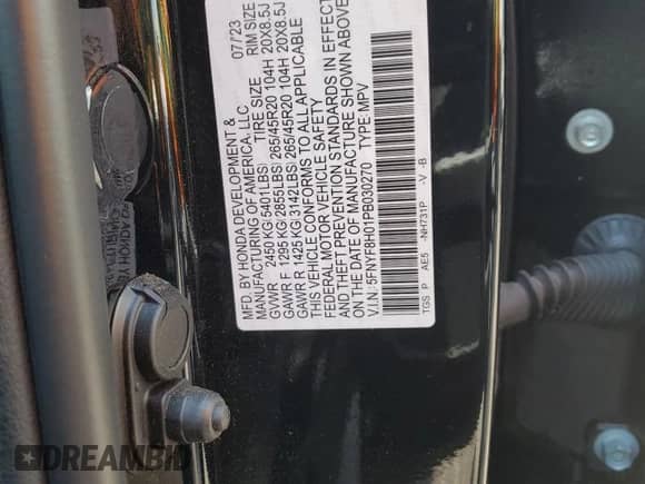 2023 Honda Passport Elite with VIN 5FNYF8H01PB030270, listed as a Copart auction lot 61402965 with 7,931 mi miles and Salvage title. Bid and sale history available at DreamBid. Image 14.