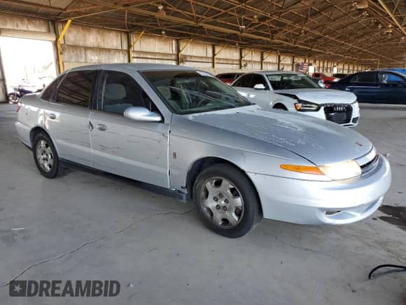 2002 Saturn LS with VIN 1G8JU54F12Y563674, listed as a Copart auction lot 63756255 with 77,822 mi miles and Salvage title. Bid and sale history available at DreamBid. Image 4.