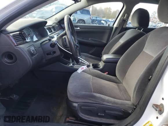 2012 Chevrolet Impala LT Retail with VIN 2G1WB5E32C1210959, listed as a Copart auction lot 89847055 with 76,493 mi miles and Salvage title. Bid and sale history available at DreamBid. Image 7.