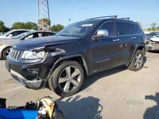 2014 Jeep Grand Cherokee Limited z VIN 1C4RJFBG8EC153216, wystawiony jako Copart lot #81001035 z przebiegiem 202 092 mil mil oraz Czysty tytuł • Clean title. Historia ofert i sprzedaży dostępna na DreamBid. Obrazek 1.
