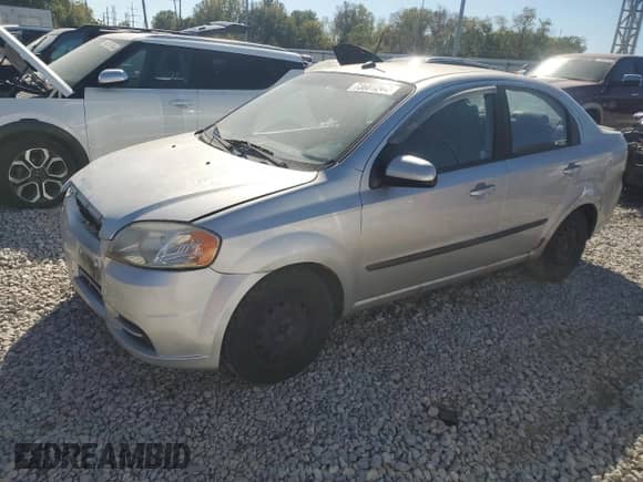 2011 Chevrolet Aveo 1LT with VIN KL1TD5DE4BB142595, listed as a Copart auction lot 73681244 with 142,436 mi miles and Salvage title. Bid and sale history available at DreamBid. Image 1.