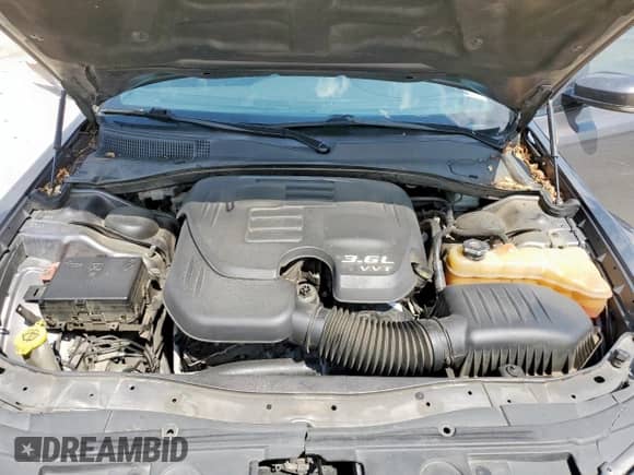 2018 Chrysler 300 S с VIN 2C3CCABG2JH243945, выставлен на аукционе Copart как лот 69658475 с пробегом 122 388 миль миль и Списание • Salvage title. История ставок и продаж доступна на DreamBid. Изображение 11.