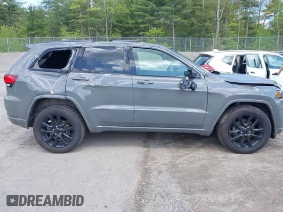 2019 Jeep Grand Cherokee Altitude with VIN 1C4RJFAG6KC845486, listed as a IAAI auction lot 42280034 with 98,718 mi miles and . Bid and sale history available at DreamBid. Image 13.