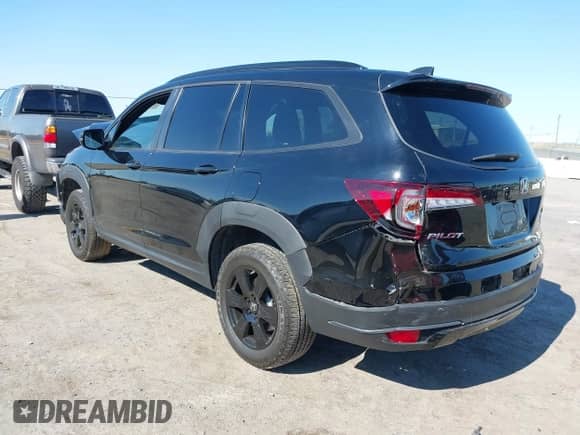 2022 Honda Pilot TrailSport with VIN 5FNYF6H89NB055828, listed as a IAAI auction lot 42761873 with 18,444 mi miles and . Bid and sale history available at DreamBid. Image 3.