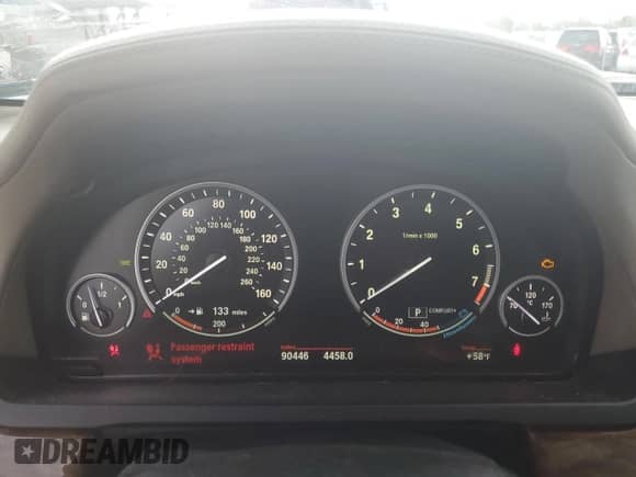 2012 BMW 7 Series 750i xDrive with VIN WBAKC6C54CC396671, listed as a Copart auction lot 55797715 with 90,446 mi miles and Salvage title. Bid and sale history available at DreamBid. Image 9.