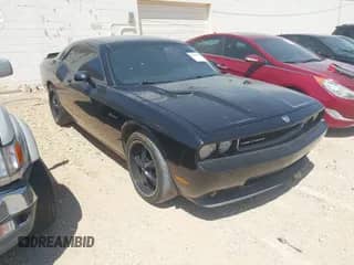 2009 Dodge Challenger R/T z VIN 2B3LJ54T49H594775, wystawiony jako IAAI lot #43214627 z przebiegiem 124 013 mil mil oraz . Historia ofert i sprzedaży dostępna na DreamBid. Obrazek 1.
