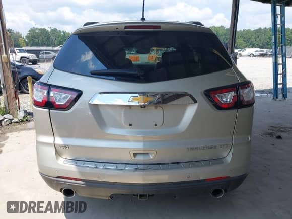 2014 Chevrolet Traverse LTZ with VIN 1GNKVJKD8EJ158689, listed as a IAAI auction lot 43038655 with 215,382 mi miles and . Bid and sale history available at DreamBid. Image 16.