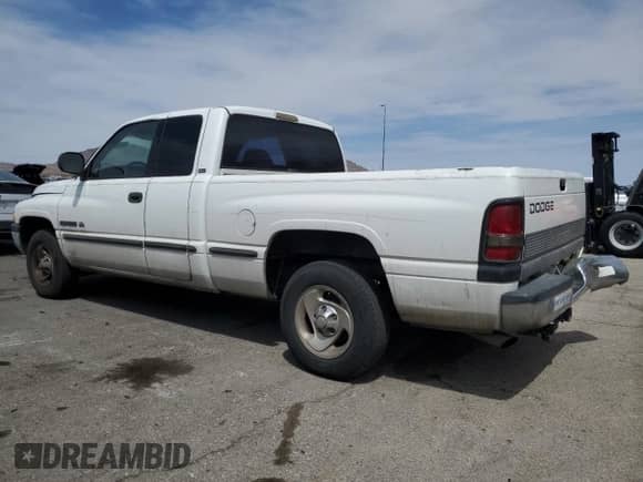 1999 Dodge 1500 with VIN 3B7HC13Z4XG127818, listed as a Copart auction lot 52090945 with 245,977 mi miles and Clean title. Bid and sale history available at DreamBid. Image 2.