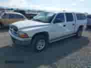2001 Dodge Dakota Sport with VIN 1B7HG2AN11S303962, listed as a IAAI auction lot 42877833 with 227,173 mi miles and . Bid and sale history available at DreamBid. Image 2.