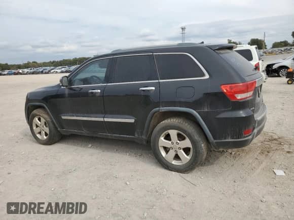 2013 Jeep Grand Cherokee Limited z VIN 1C4RJEBG4DC636503, wystawiony jako Copart lot #89665075 z przebiegiem 143 877 mil mil oraz Czysty tytuł • Clean title. Historia ofert i sprzedaży dostępna na DreamBid. Obrazek 2.