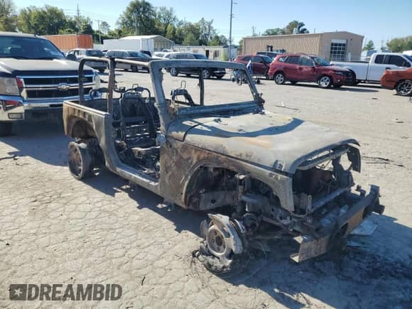 2013 Jeep Wrangler Rubicon with VIN 1C4BJWCG7DL592535, listed as a Copart auction lot 74841564 with Not provided miles and Salvage title. Bid and sale history available at DreamBid. Image 4.