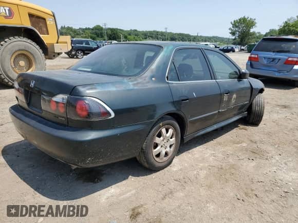 2001 Honda Accord EX z VIN 1HGCG66861A015947, wystawiony jako Copart lot #65003915 z przebiegiem 274 609 mil mil oraz Szkoda całkowita • Salvage title. Historia ofert i sprzedaży dostępna na DreamBid. Obrazek 3.