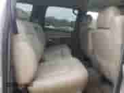 2000 Chevrolet Suburban LT z VIN 3GNEC16T8YG223051, wystawiony jako Copart lot #84419604 z przebiegiem 237 923 mil mil oraz Czysty tytuł • Clean title. Historia ofert i sprzedaży dostępna na DreamBid. Obrazek 11.