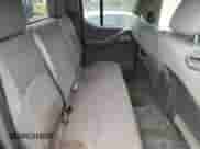 2012 Nissan Frontier SL z VIN 1N6AD0EV4CC467421, wystawiony jako Copart lot #82150615 z przebiegiem 171 155 mil mil oraz Szkoda całkowita • Salvage title. Historia ofert i sprzedaży dostępna na DreamBid. Obrazek 10.