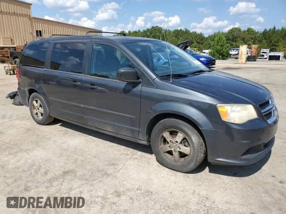2012 Dodge Grand Caravan SXT with VIN 2C4RDGCG2CR264666, listed as a Copart auction lot 81803935 with 204,945 mi miles and Clean title. Bid and sale history available at DreamBid. Image 4.