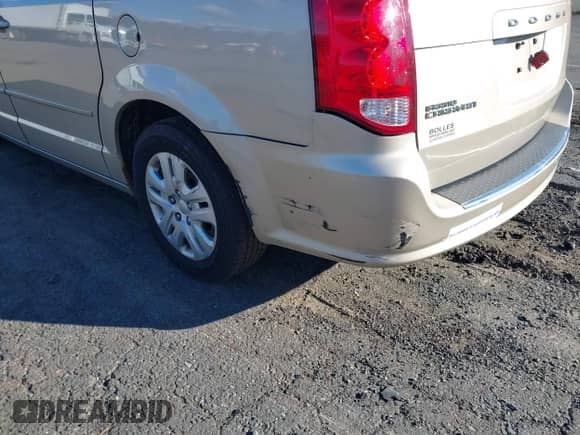 2014 Dodge Grand Caravan SE z VIN 2C4RDGBG2ER106719, wystawiony jako IAAI lot #43560873 z przebiegiem 183 833 mil mil oraz . Historia ofert i sprzedaży dostępna na DreamBid. Obrazek 6.