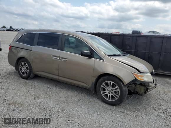 2012 Honda Odyssey EX with VIN 5FNRL5H48CB106771, listed as a Copart auction lot 69810795 with 140,290 mi miles and Salvage title. Bid and sale history available at DreamBid. Image 4.