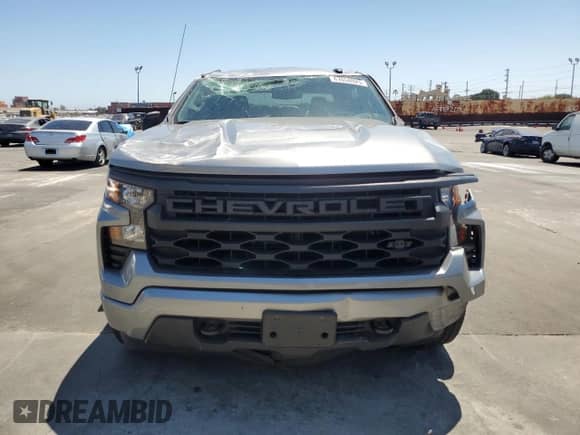 2023 Chevrolet Silverado 1500 Custom with VIN 1GCRABEK7PZ329665, listed as a Copart auction lot 67058025 with 26,252 mi miles and Salvage title. Bid and sale history available at DreamBid. Image 5.