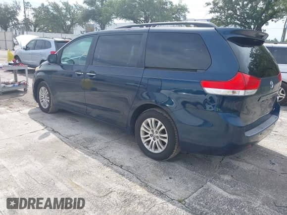 2011 Toyota Sienna XLE AAS with VIN 5TDYK3DC6BS021552, listed as a IAAI auction lot 43264289 with 283,765 mi miles and . Bid and sale history available at DreamBid. Image 3.