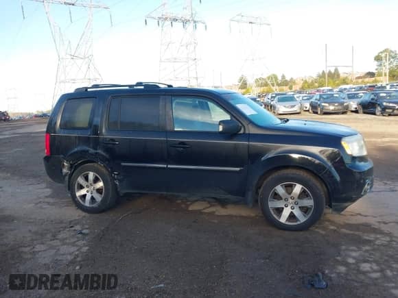 2015 Honda Pilot Touring с VIN 5FNYF4H92FB004685, выставлен на аукционе IAAI как лот 43500533 с пробегом 169 841 миль миль и . История ставок и продаж доступна на DreamBid. Изображение 14.