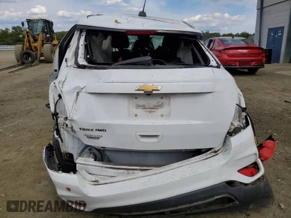 2021 Chevrolet Trax LS with VIN KL7CJNSB4MB349871, listed as a Copart auction lot 70451965 with 56,246 mi miles and Salvage title. Bid and sale history available at DreamBid. Image 6.