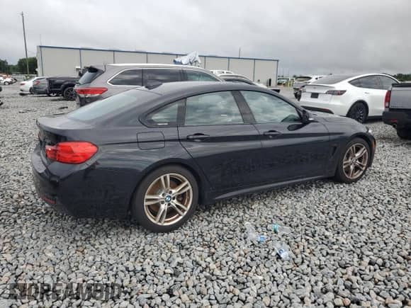 2017 BMW 4 Series 430i with VIN WBA4F7C39HG789571, listed as a Copart auction lot 85137115 with 115,614 mi miles and Salvage title. Bid and sale history available at DreamBid. Image 3.