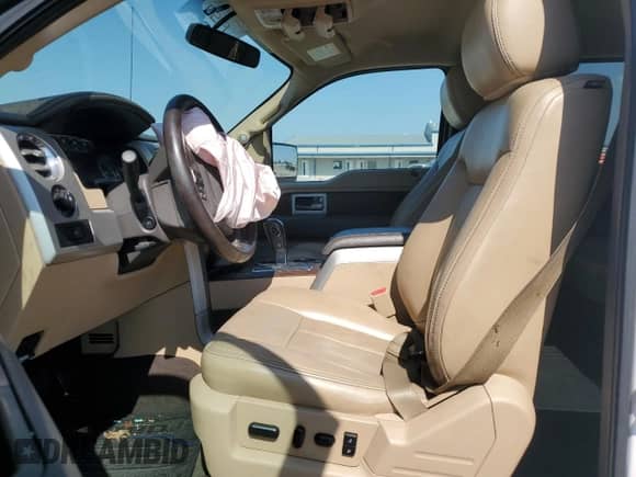 2013 Ford F-150 Lariat z VIN 1FTFW1ET9DKD16055, wystawiony jako Copart lot #84370865 z przebiegiem Nie podano mil oraz Szkoda całkowita • Salvage title. Historia ofert i sprzedaży dostępna na DreamBid. Obrazek 7.