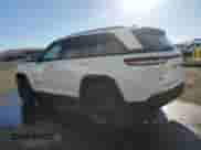 2024 Jeep Grand Cherokee Altitude with VIN 1C4RJHAG7R8519981, listed as a Copart auction lot 84902025 with 59,118 mi miles and Salvage title. Bid and sale history available at DreamBid. Image 2.