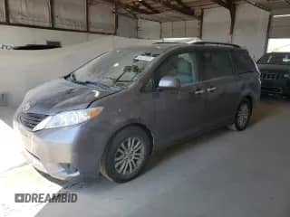 2012 Toyota Sienna XLE AAS with VIN 5TDYK3DCXCS219858, listed as a Copart auction lot 80370005 with 150,472 mi miles and Salvage title. Bid and sale history available at DreamBid. Image 1.