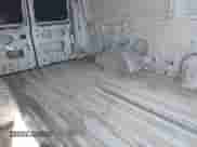 2001 Ford Econoline Cargo z VIN 1FTSE34LX1HA85240, wystawiony jako IAAI lot #41734607 z przebiegiem 216 818 mil mil oraz . Historia ofert i sprzedaży dostępna na DreamBid. Obrazek 8.