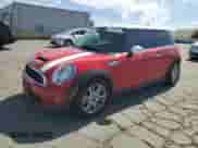 2011 MINI Hardtop S with VIN WMWSV3C50BTY12562, listed as a Copart auction lot 61183425 with 125,126 mi miles and Salvage title. Bid and sale history available at DreamBid. Image 1.