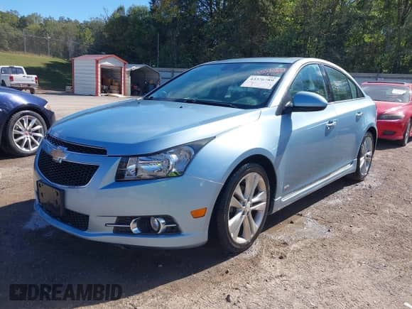 2012 Chevrolet Cruze LTZ with VIN 1G1PH5SCXC7328851, listed as a IAAI auction lot 43376789 with 232,900 mi miles and . Bid and sale history available at DreamBid. Image 2.