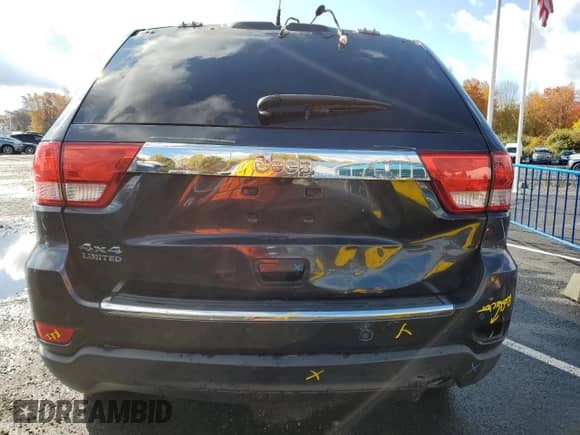 2013 Jeep Grand Cherokee Limited z VIN 1C4RJFBG2DC640359, wystawiony jako Copart lot #86685655 z przebiegiem 150 067 mil mil oraz Szkoda całkowita • Salvage title. Historia ofert i sprzedaży dostępna na DreamBid. Obrazek 6.