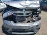 2019 Dodge Journey SE with VIN 3C4PDCBG0KT798004, listed as a IAAI auction lot 43012657 with 74,633 mi miles and . Bid and sale history available at DreamBid. Image 6.