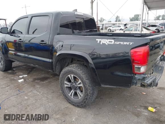2017 Toyota Tacoma SR5 with VIN 3TMAZ5CN3HM026387, listed as a IAAI auction lot 42362780 with 216,739 mi miles and . Bid and sale history available at DreamBid. Image 3.