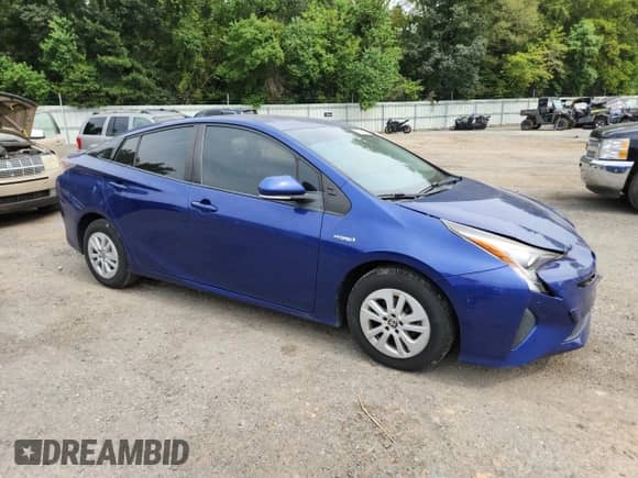 2016 Toyota Prius Two with VIN JTDKBRFU5G3515537, listed as a Copart auction lot 71276835 with 124,439 mi miles and Salvage title. Bid and sale history available at DreamBid. Image 4.