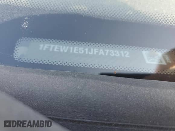 2018 Ford F-150 XL with VIN 1FTEW1E51JFA73312, listed as a Copart auction lot 71199695 with Not provided miles and Salvage title. Bid and sale history available at DreamBid. Image 13.