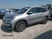 2021 Honda Pilot Touring 7-Passenger z VIN 5FNYF6H63MB025849, wystawiony jako Copart lot #60432205 z przebiegiem 78 277 mil mil oraz Czysty tytuł • Clean title. Historia ofert i sprzedaży dostępna na DreamBid. Obrazek 1.