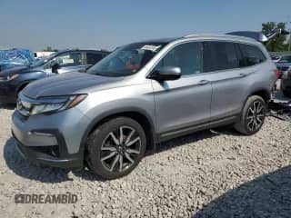 2021 Honda Pilot Touring 7-Passenger z VIN 5FNYF6H63MB025849, wystawiony jako Copart lot #60432205 z przebiegiem 78 277 mil mil oraz Czysty tytuł • Clean title. Historia ofert i sprzedaży dostępna na DreamBid. Obrazek 1.