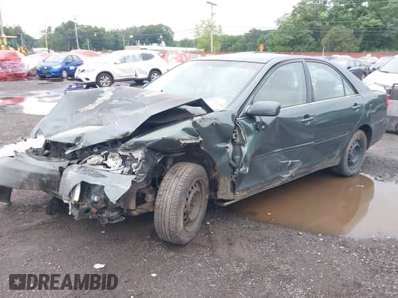 2004 Toyota Camry LE with VIN 4T1BE32K44U378150, listed as a IAAI auction lot 42875254 with 234,913 mi miles and . Bid and sale history available at DreamBid. Image 16.