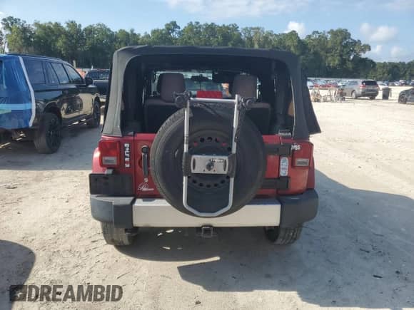 2011 Jeep Wrangler Sahara с VIN 1J4AA5D16BL606416, выставлен на аукционе Copart как лот 68573425 с пробегом 93 108 миль миль и Чистый • Clean title. История ставок и продаж доступна на DreamBid. Изображение 6.